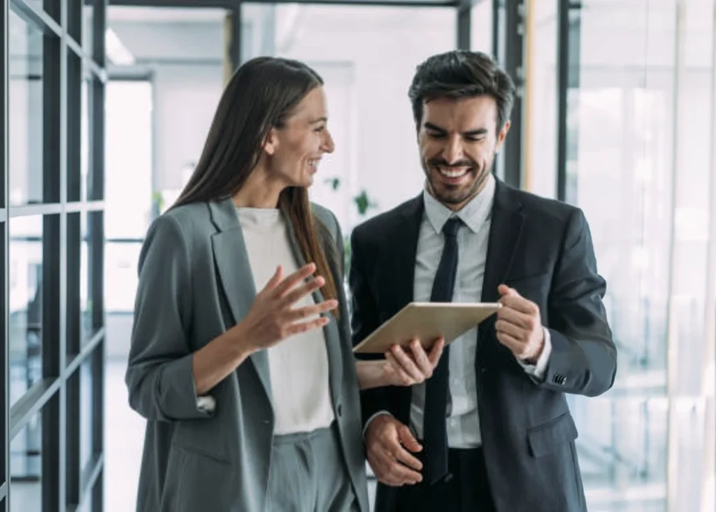 Two professionals happy with results of a tax plan