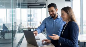 Female CFO explaining financials to business owner.